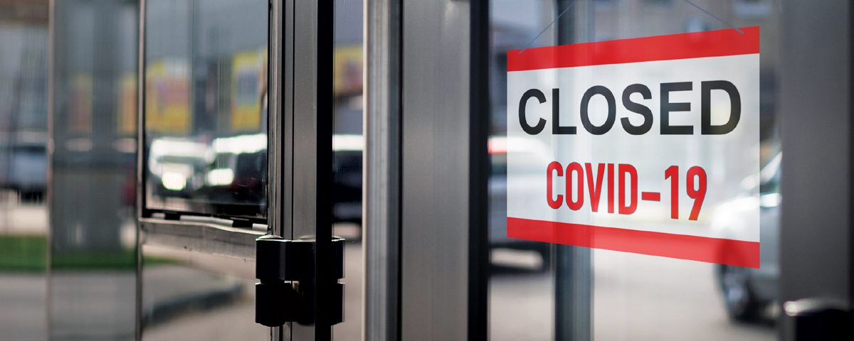 COVID-19 closure sign on a door